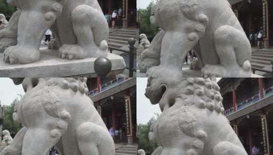 石狮子雕塑石刻狮子滚绣球高清在线视频素材下载
