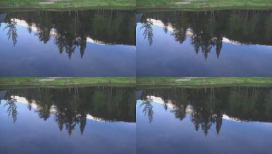 湖面上的树林倒影景观高清在线视频素材下载