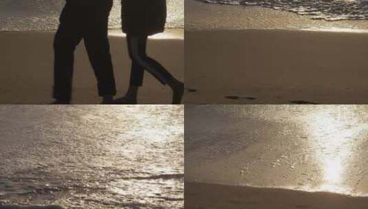 海边散步的情侣剪影高清在线视频素材下载