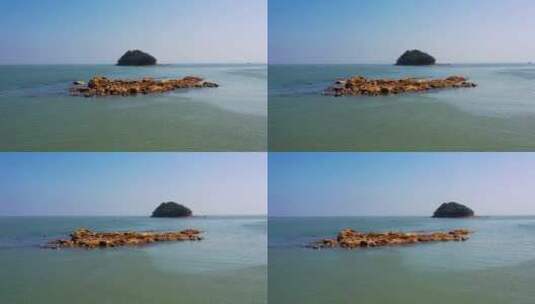 航拍礁石与无人小岛高清在线视频素材下载