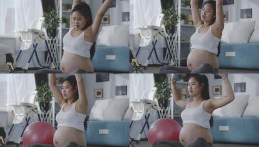 怀孕的美女在健身锻炼身体做瑜伽动作高清在线视频素材下载