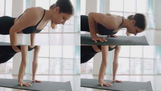 运动美女做俯卧撑作为交叉健身健身房训练的一部分高清在线视频素材下载