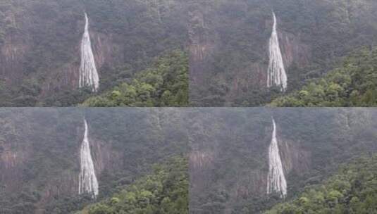 山顶的一条大瀑布倾泻而下高清在线视频素材下载