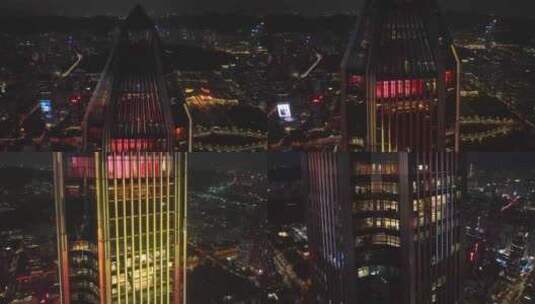 航拍深圳平安金融中心玻璃幕墙反光夜景灯光高清在线视频素材下载