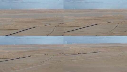 航拍货车行驶在青海荒漠中的315国道上高清在线视频素材下载