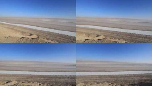 突尼斯肖特杰里德晴朗蓝天下的广阔盐滩，荒高清在线视频素材下载