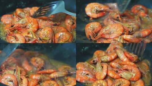 中餐家常菜烹饪油爆大虾锅中汤汁冒泡热气高清在线视频素材下载