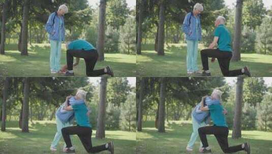 感恩的老年妻子拥抱丈夫在春夏公园的运动鞋高清在线视频素材下载