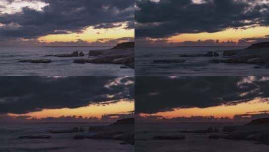 日落在海浪上岩石延时高清在线视频素材下载