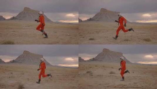 宇航员，沙漠，跑步，橙色工作服高清在线视频素材下载