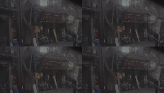 店铺 路面 凌晨 车辆 行驶 城市街道高清在线视频素材下载