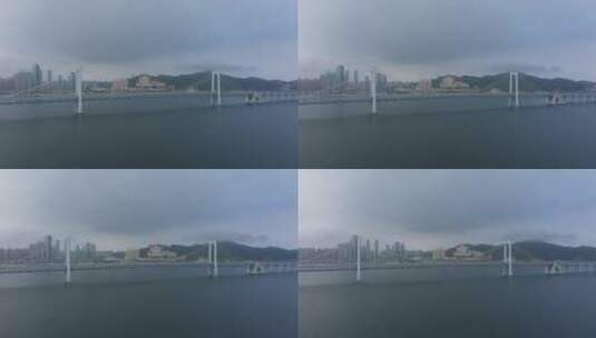 航拍大连跨海大桥，大海向内拍摄高清在线视频素材下载