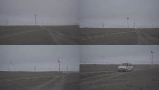 蒙古风车草原上汽车从远处驶来高清在线视频素材下载