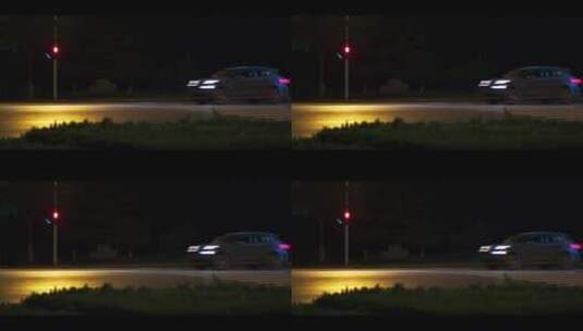 夜间马路上汽车横向快速开过高清在线视频素材下载