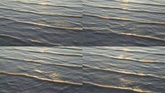 日落时分，江面一条一条的波纹高清在线视频素材下载