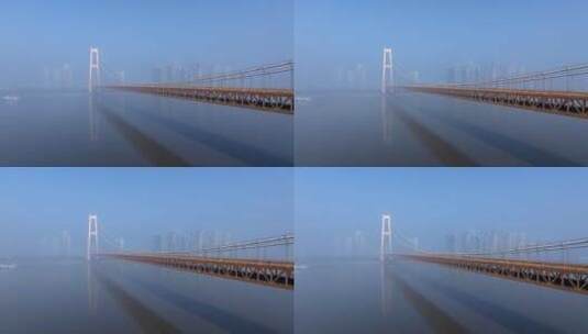 航拍云雾中的清晨武汉杨泗港大桥高清在线视频素材下载