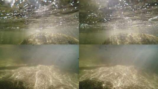 gopro水下拍摄阳光洒进水中照在河床上高清在线视频素材下载