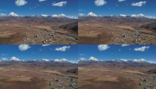 川西塔公草原的藏族村庄航拍高清在线视频素材下载