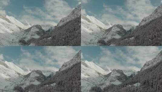航拍雪山冬天森林山峰山脉山脊雪松原始森林高清在线视频素材下载