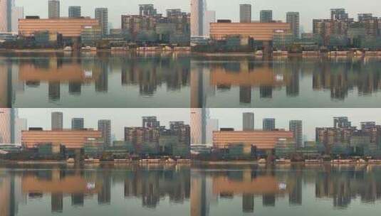 湖边城市建筑倒影高清在线视频素材下载