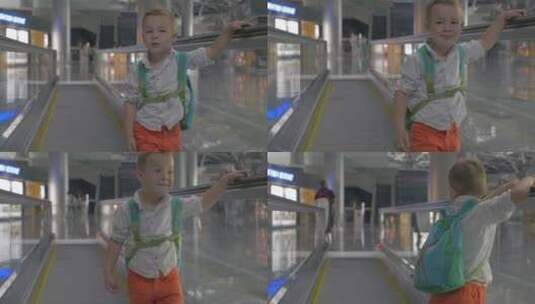 可爱的小男孩在机场扶梯上高清在线视频素材下载