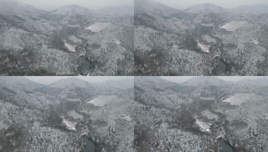 航拍南方丘陵山川森林美丽乡村雪景高清在线视频素材下载