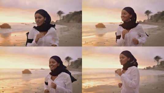 日落时分在海滩上慢跑的索马里裔美国妇女高清在线视频素材下载