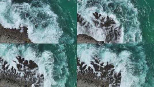 印尼巴厘岛清澈绿松石海水击打礁石溅起浪花高清在线视频素材下载