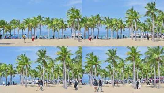 海南三亚西岛蓝天白云下的椰树沙滩与游客高清在线视频素材下载
