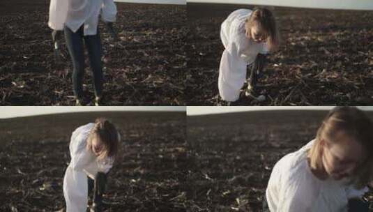 农妇检查她的田地。农业女孩检查种子是如何高清在线视频素材下载