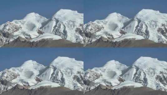 长焦下的西藏念青唐古拉山脉雪山山峰景观高清在线视频素材下载