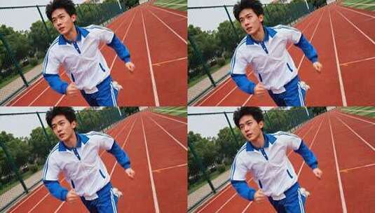 校园跑道上男生跑步画面高清在线视频素材下载