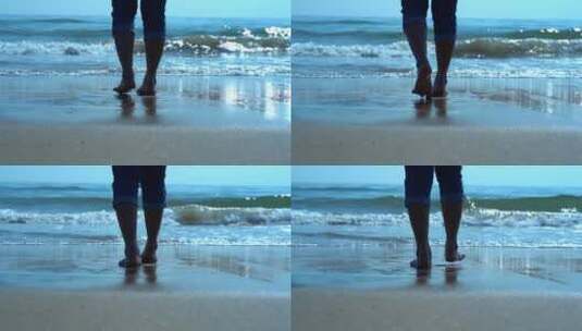 沙滩上人的双腿的特写高清在线视频素材下载