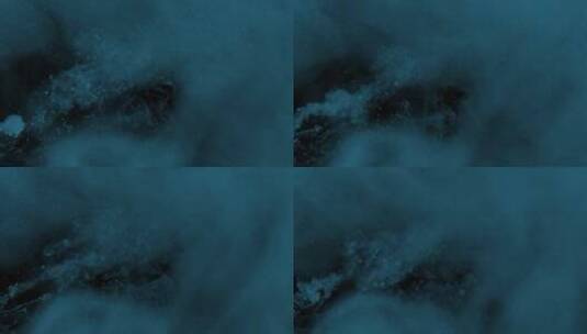 冷蓝色水中的微粒高清在线视频素材下载