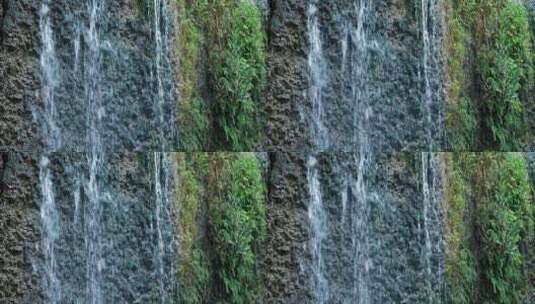 山间瀑布的潺潺水流高清在线视频素材下载