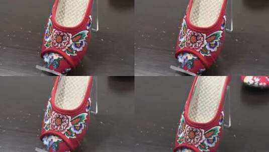 移动镜头北京传统手工艺品_绣花鞋高清在线视频素材下载