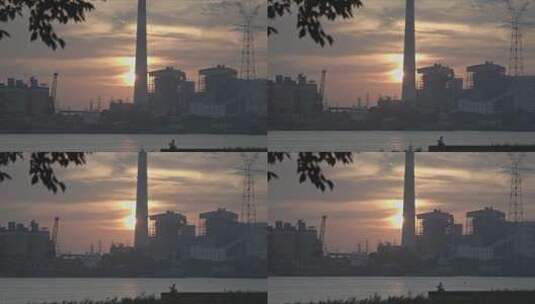 夕阳下火电厂冷凝塔烟囱冒烟4K实拍高清在线视频素材下载