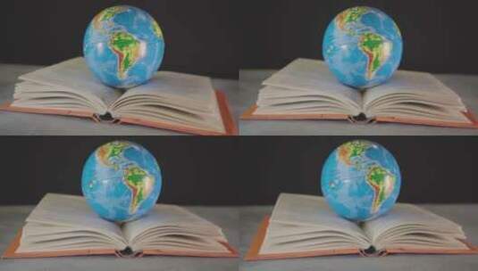 书籍上的地球仪高清在线视频素材下载
