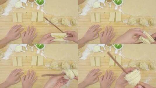 用筷子把面团卷成花卷高清在线视频素材下载