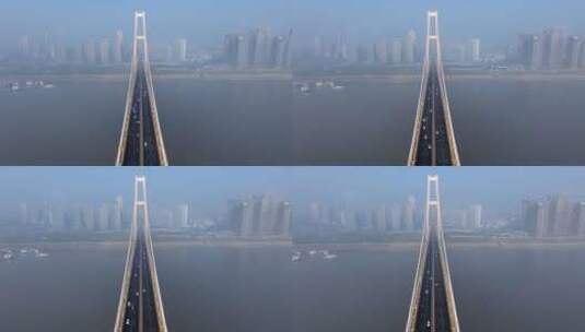 航拍云雾中的武汉杨泗港大桥高清在线视频素材下载