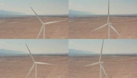 广袤平原上的风力发电设备特写高清在线视频素材下载
