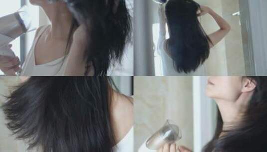 早晨女孩在浴室吹头发背影视频素材高清在线视频素材下载