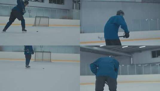 曲棍球运动员用棍子打冰球高清在线视频素材下载