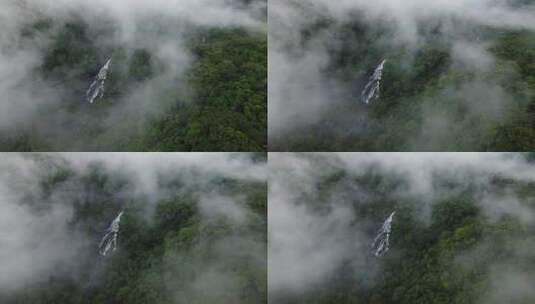 空中视差穿过隐藏在茂密雨林中的瀑布雾高清在线视频素材下载