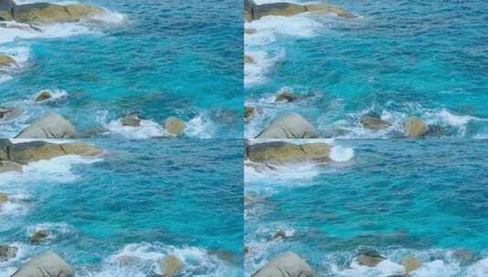 蓝色海浪拍打礁石岩石 海边浪花波涛汹涌高清在线视频素材下载