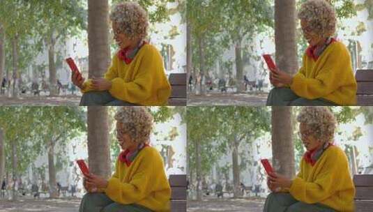 妇女在公园用手机视频高清在线视频素材下载