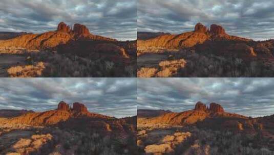 亚利桑那州塞多纳日落地平线上戏剧性云彩的大教堂岩石。回调镜头高清在线视频素材下载