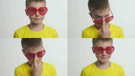 男孩用心形眼镜庆祝情人节高清在线视频素材下载