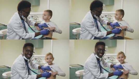 医生在医院办公室检查小男孩。高清在线视频素材下载
