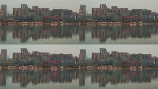 湖边城市建筑倒影高清在线视频素材下载